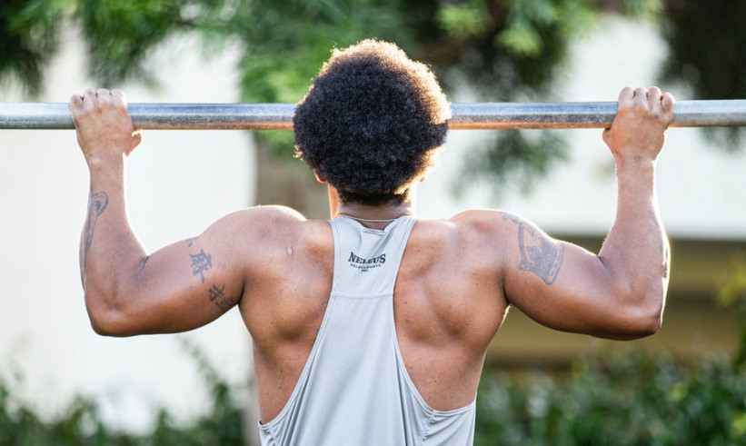 A man doing pull-ups