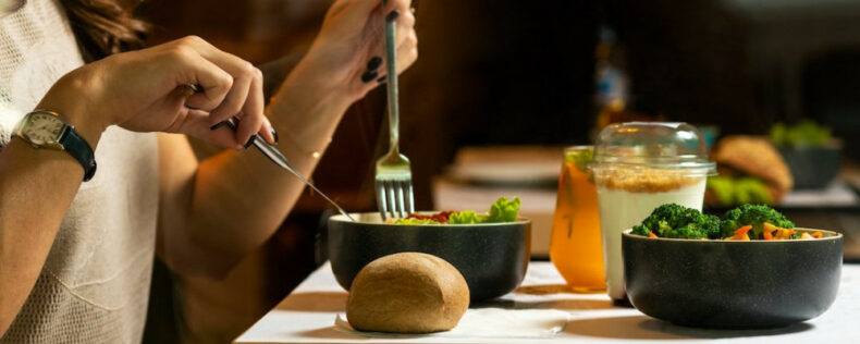 Person eating a salad