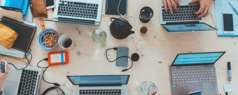 Several laptops on a table