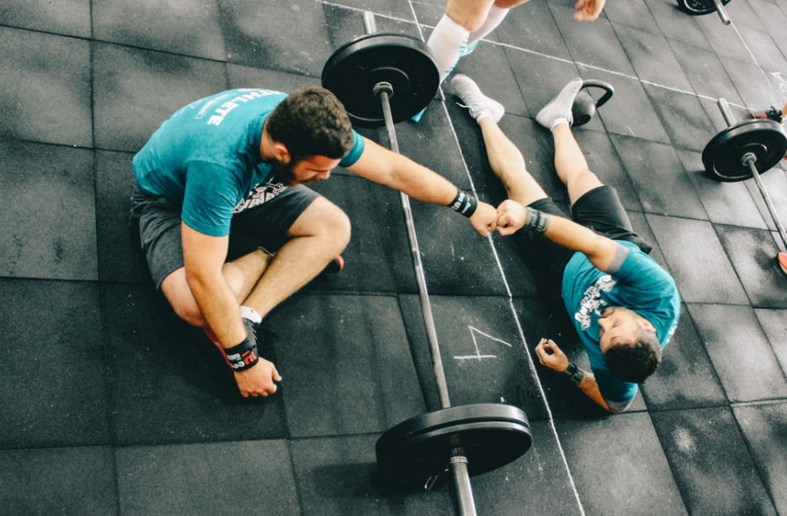 Working out with a friend is a great way for how to get started in the gym