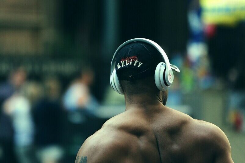 A person listening to music with headphones